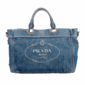 Prada tote, denim and gold hardware.